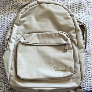 Calpak Backpack in a light silvery purple color  New without tag